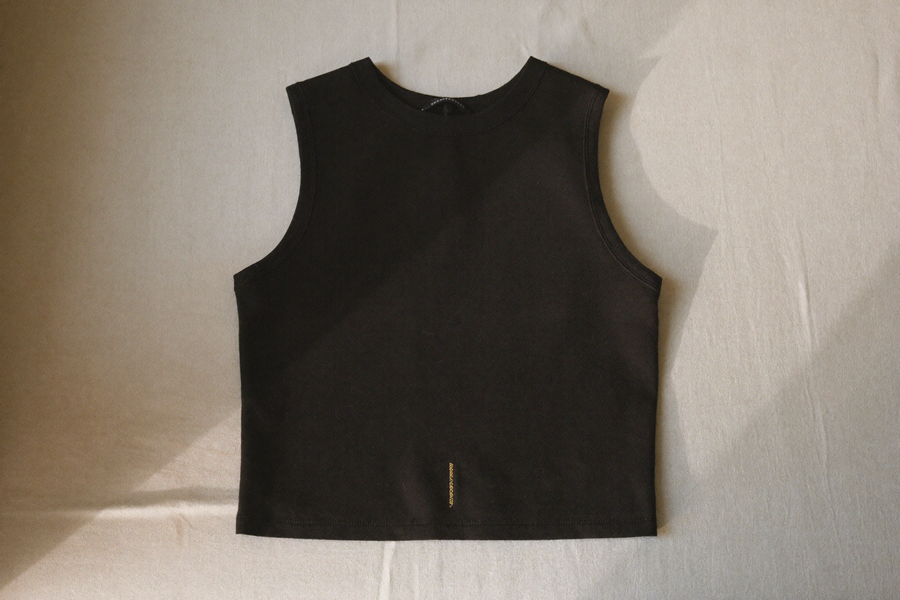 UNDR Daily Compression Vest displayed alone on bone surface