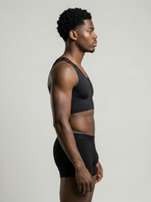 Close-up of the UNDR compression vest 3-row hook closure, adjustable fit detail