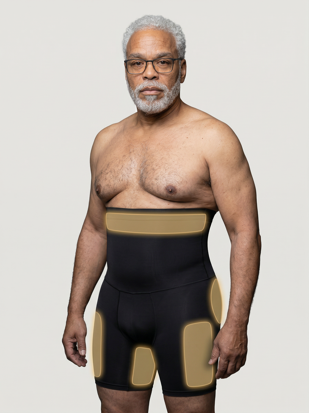 Man wearing a black and beige compression garment against a plain background