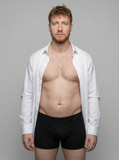UNDR Core Support Band under a white shirt, seamless profile